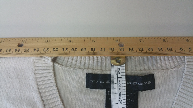 The back neck depth for this sweater is 3/4".