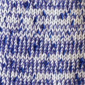 Textured yarn + Plain yarn (different weights) "held together" in the same feeder slot Knit side