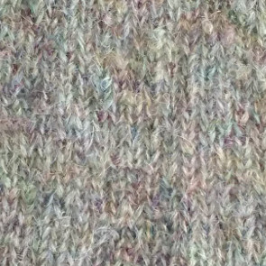 Textured yarns plated. Notice how the "hairy" yarn overpowers the other yarn. Knit side.