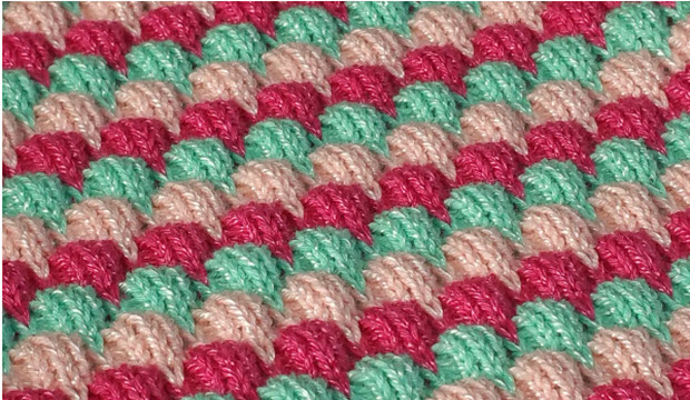 Combine with color changes for an interesting effect. Change colors every 6 rows Tuck Baby Punchcard