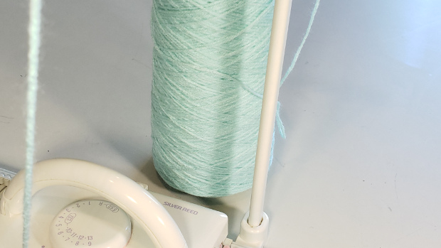 If you can get them, cones work great ... plus fewer yarn ends to work in