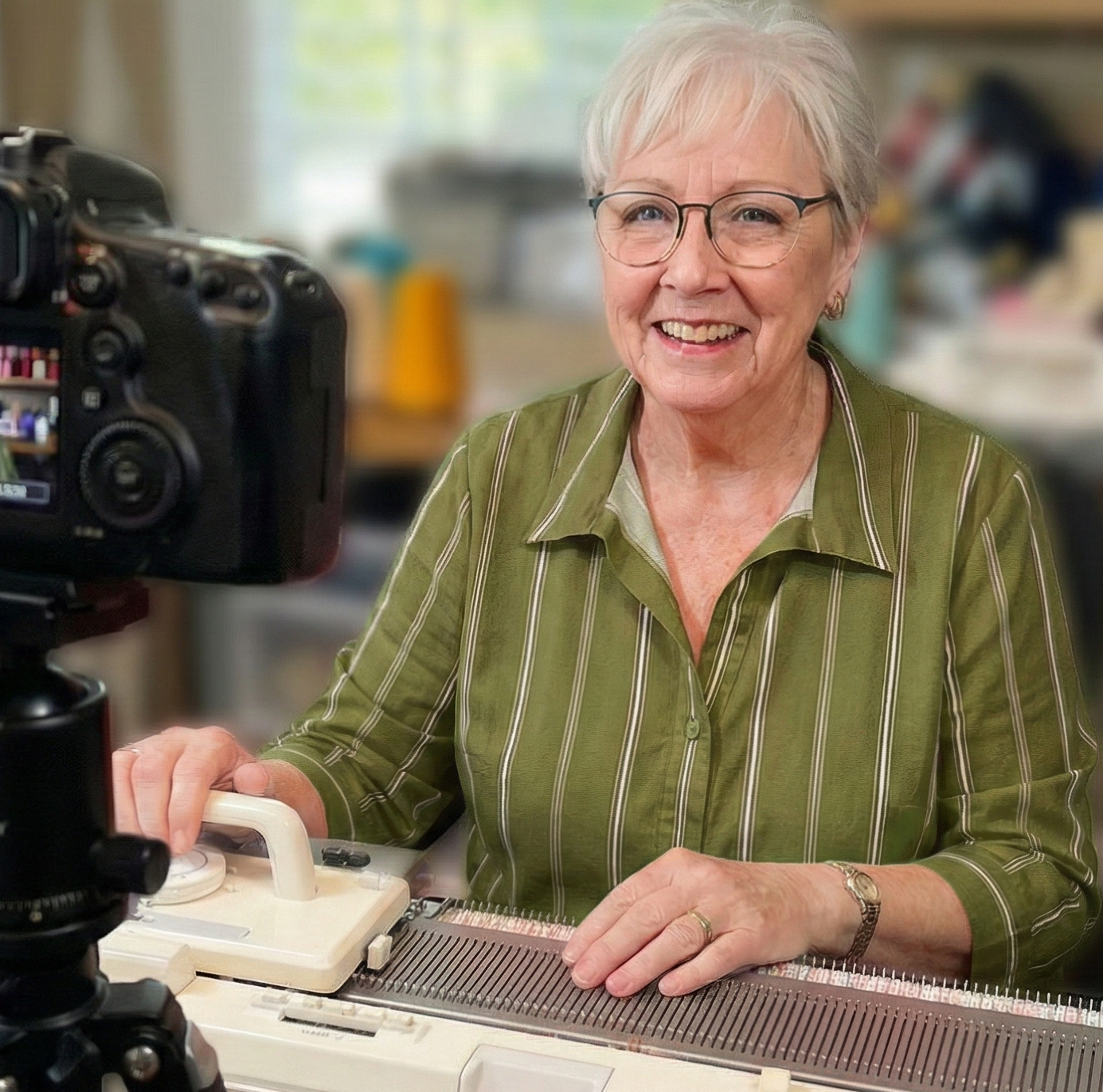Sue helping with a knitting machine