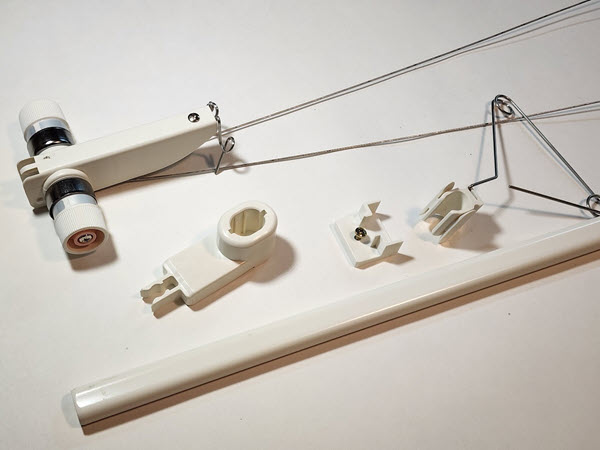 The five components included in the LK150 Second Tension Mast Kit.