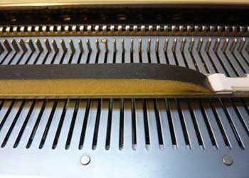Close-up of removing or inspecting the sponge bar